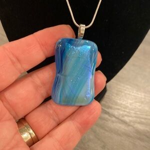Delmarva Designs blue and dichroic fused glass pendant on 18” silver chain